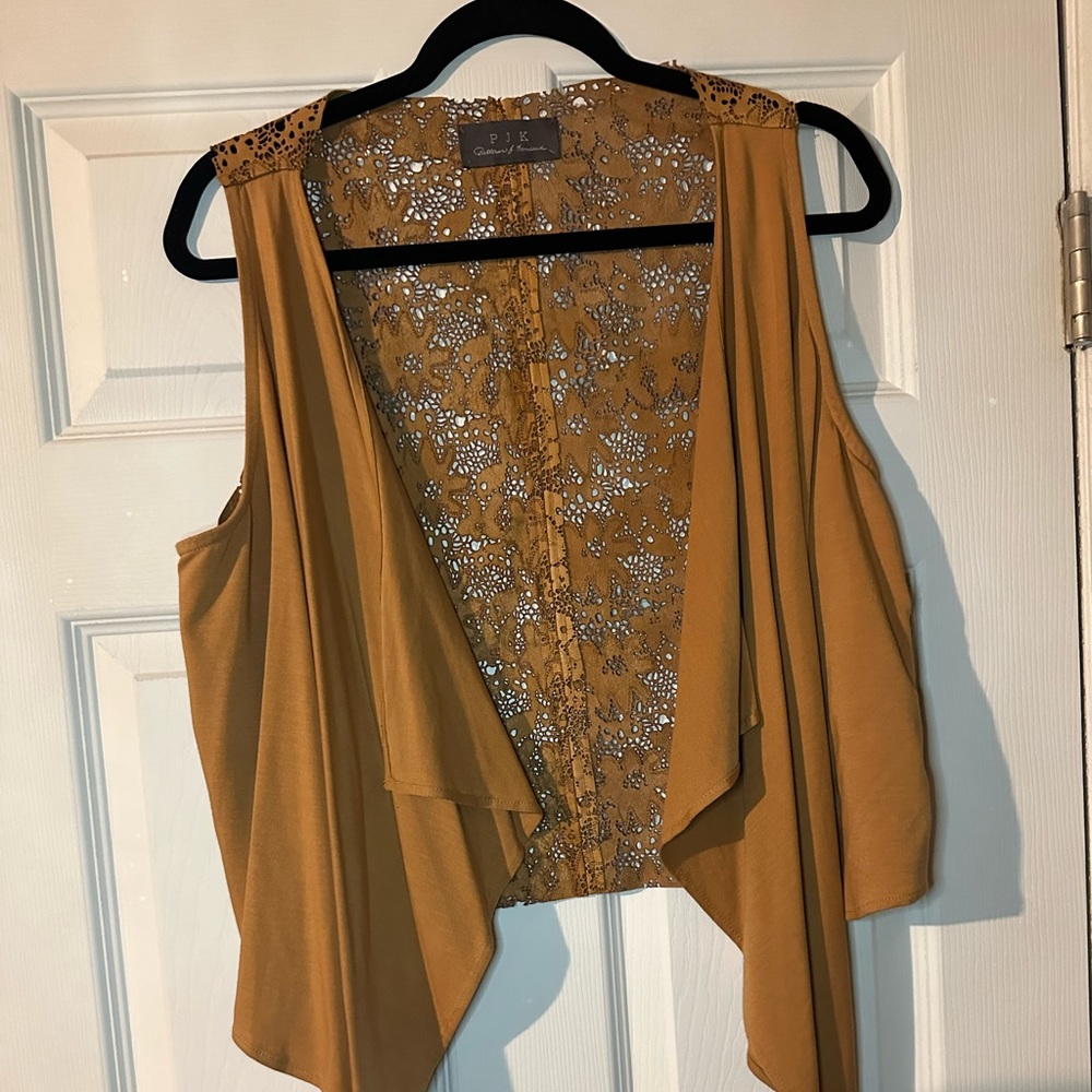 Patterson J Kincaid laser cut vest